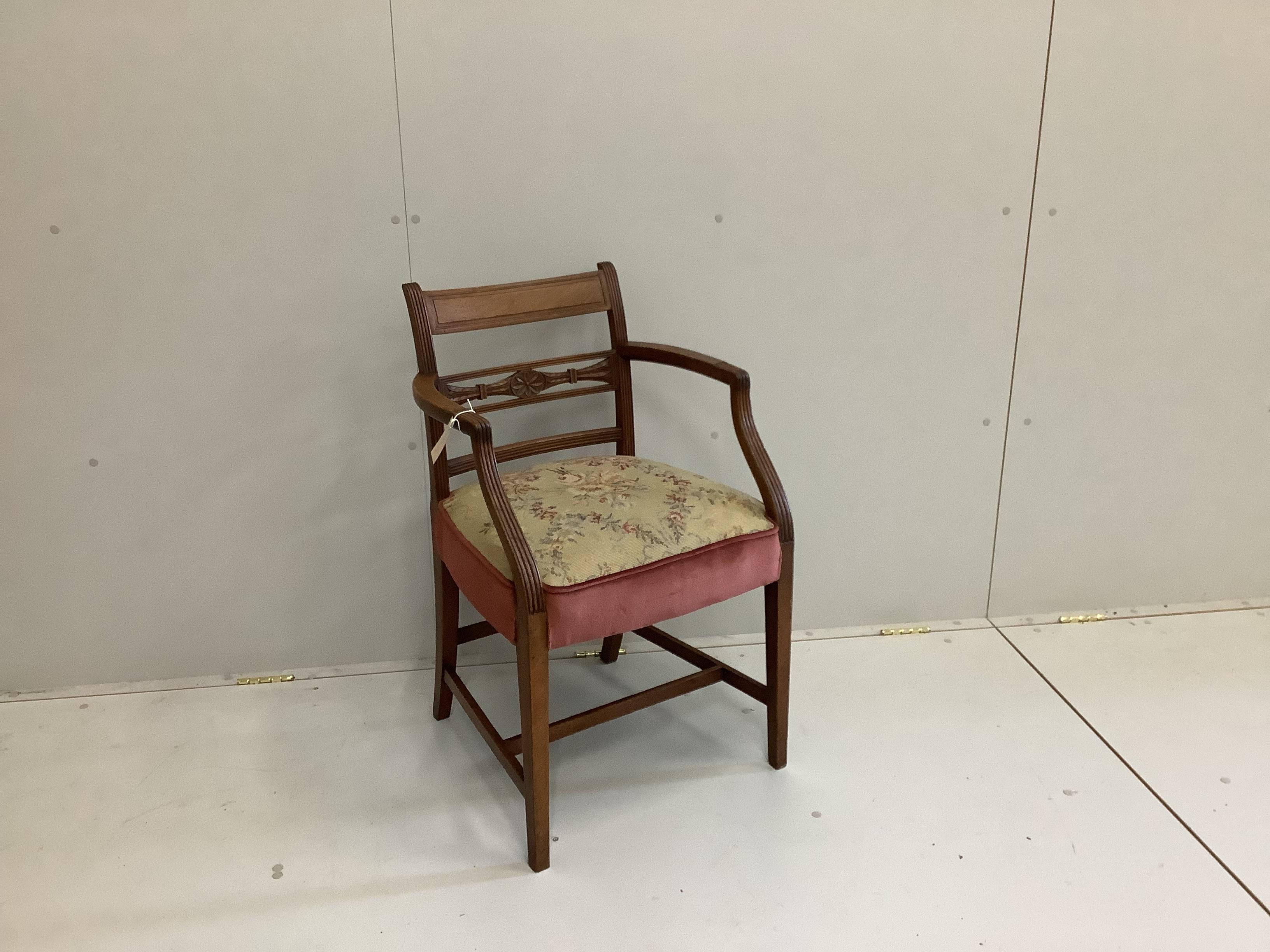 A George III mahogany elbow chair